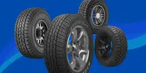 4 AT Tyres on Blue Background