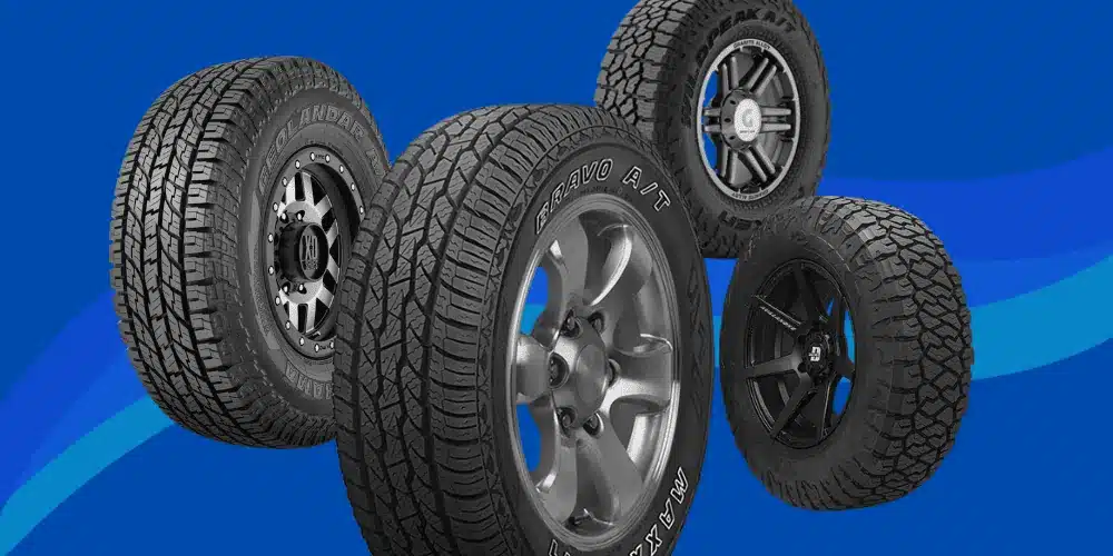 4 AT Tyres on Blue Background